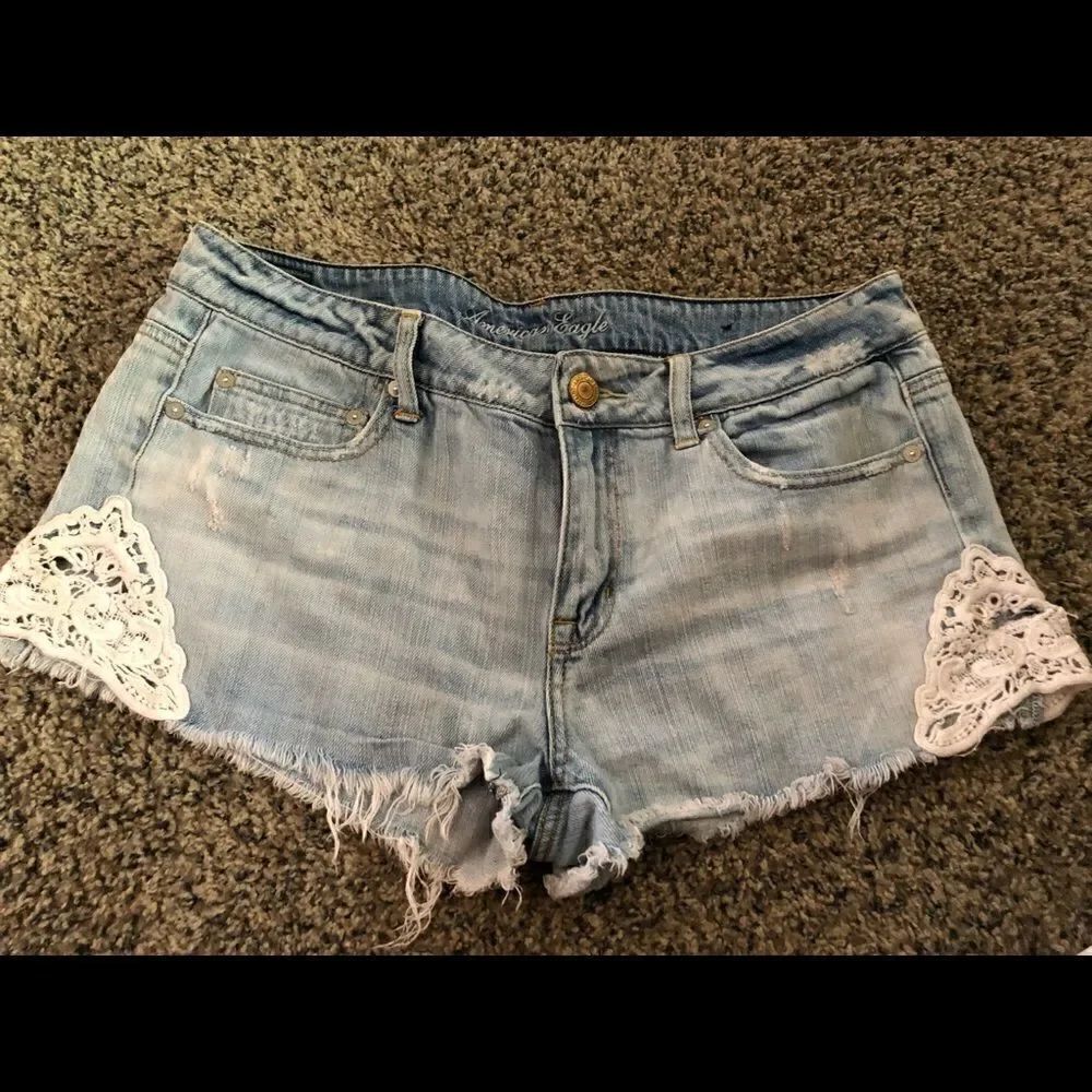 Vintage American Eagle denim cut off shorts with lace cut out sides size 12.